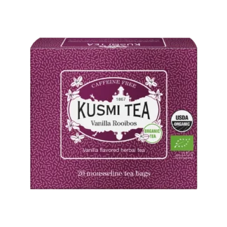 Fioletowe pudełko herbaty Kusmi Tea Vanilla Rooibos z napisem "Caffeine Free" i "Organic Tea." Zawiera herbatę rooibos o smaku waniliowym, w formie 20 piramidek z certyfikatem USDA Organic oraz unijnym certyfikatem ekologicznym. Elegancka grafika z motywem wanilii.