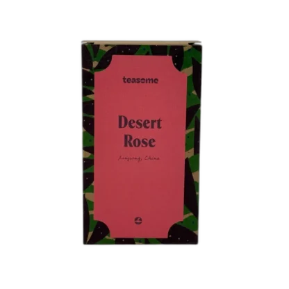 Kolorowe opakowanie herbaty ziołowej Teasome Desert Rose 50 g z różową etykietą i wzorem liści, dostępne w sklepie z kawą i herbatą