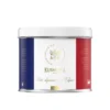 Puszka 100 g herbaty Kusmi Tea Petit déjeuner à l’Élysée ozdobiona barwami flagi Francji i złotym herbem Pałacu Elizejskiego.