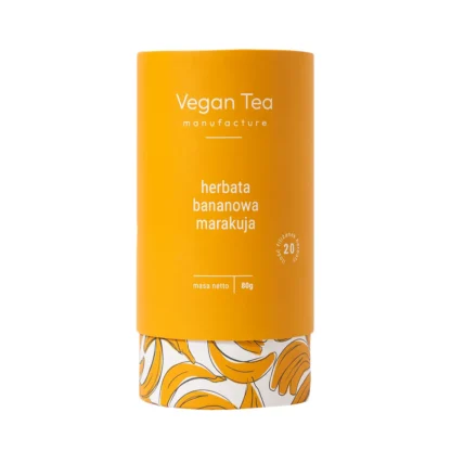Żółtopomarańczowe opakowanie herbaty Vegan Tea z napisem: „herbata bananowa marakuja, masa netto 80g, 20 filiżanek naparu”. Dolna część puszki ozdobiona grafiką bananów. Tropikalna kompozycja smaków idealna na słoneczne dni.