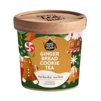 Obrazek przedstawia herbatę rooibos o smaku piernika, pięknie zapakowaną w kolorowym pojemniku. Idealna na zimowe wieczory, ta aromatyczna herbata z cynamonem i kakao wprowadza świąteczny nastrój do każdego domu.